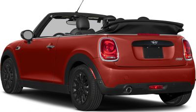 Rear view of convertible with folded soft top and black wheels