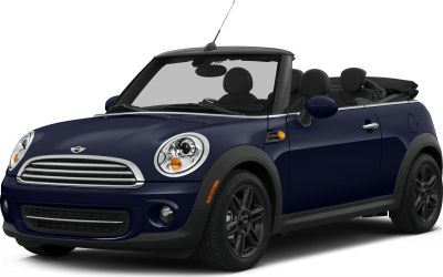 Open-top convertible with rounded headlights and black rims