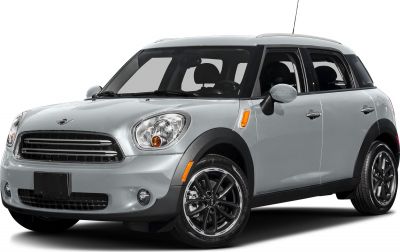 Silver compact SUV front side view with headlight and grille