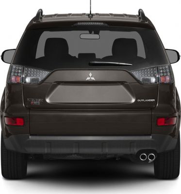 Rear tailgate with distinct tail lights and dual exhaust pipes