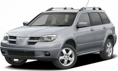 Front 3-4 view of a silver SUV with roof rails and alloy wheels
