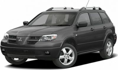 Front three-quarter view of SUV with roof rails and specific headlight design.