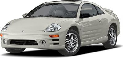Front angled view of a compact sports coupe with alloy wheels and fog lights