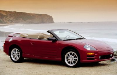 Red convertible with beige interior and sporty design