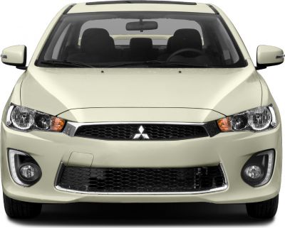 Front view with hexagonal grille, sharp headlights, and integrated fog lights