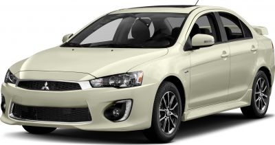 Front-side view of sporty sedan with aerodynamic body kit and sport rims