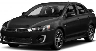 Front-side view of a sporty sedan with alloy wheels and fog lights