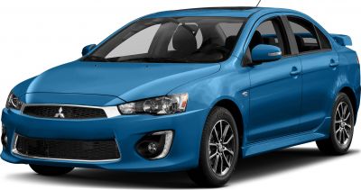 Front side view of blue sedan with detailed headlights and alloy wheels.