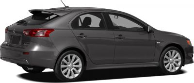 Rear side view with spoiler and alloy wheels