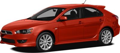 Red sporty hatchback car side-angle with alloy wheels