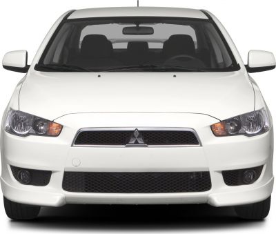 Front view showing grille, headlights, and fog lights