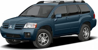 Front side view of a blue SUV with roof rails