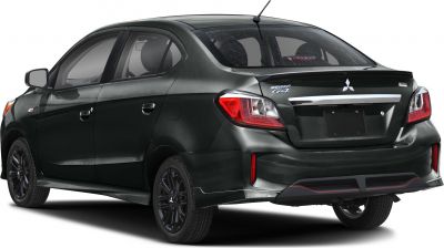 Rear profile showing tail lights, black alloy wheels, and spoiler