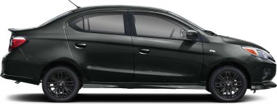 Side profile of a compact sedan with tinted windows and black alloy wheels.