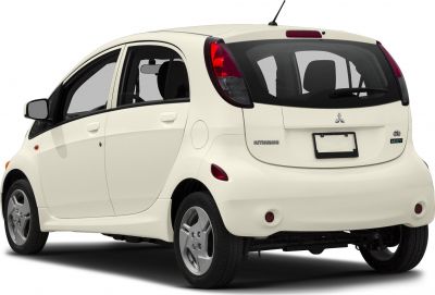 Rear view of a compact electric 5-door hatchback with distinctive taillights and rear windshield wiper.