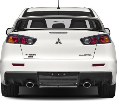Rear view with taillights, spoiler, dual exhausts, and aerodynamic diffuser