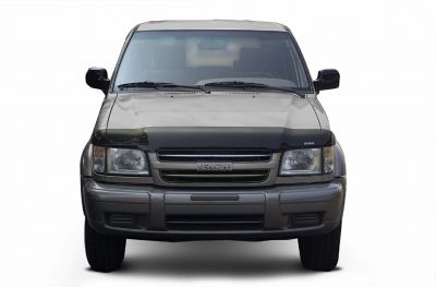 Front view with rectangular headlights and bold grille