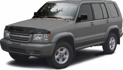 Front three-quarter view of mid-sized SUV with distinct grille and side profile