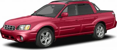 Front angle view of a red pickup truck with sporty design and two-tone paint.