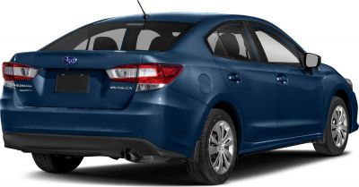 Rear exterior with rear light cluster and exhaust visible.
