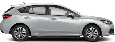 Side profile of a hatchback with alloy wheels and roof antenna