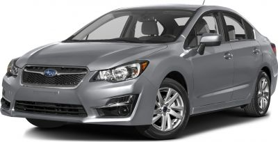 Compact sedan front angled view with headlights and alloy wheels.