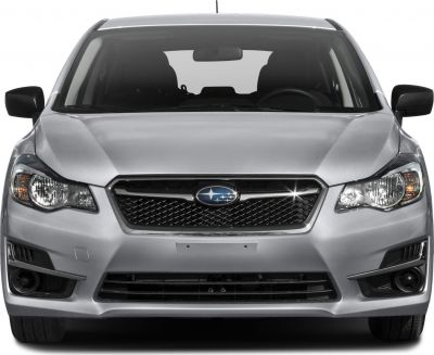 Front grille and headlights of a compact hatchback.