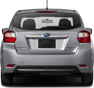 Rear view with tail lights, badges, and rear window of a hatchback