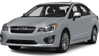 Modern headlights and alloy wheels on a silver sedan front view