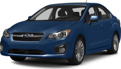 Front side view of a modern sedan with distinct headlights and alloy wheels