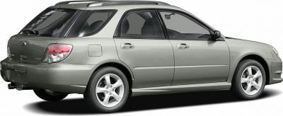 Rear side view of a facelifted station wagon with alloy wheels