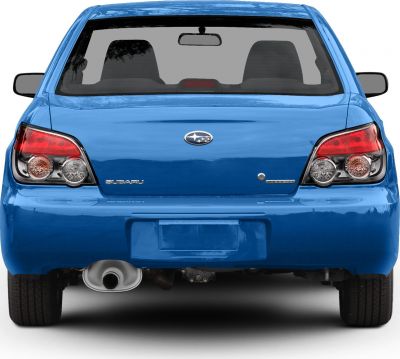 Rear view with distinctive tail lights and single exhaust tip
