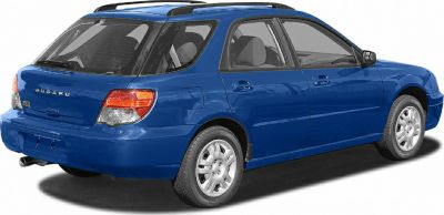 Blue station wagon with roof rails and rear roof spoiler
