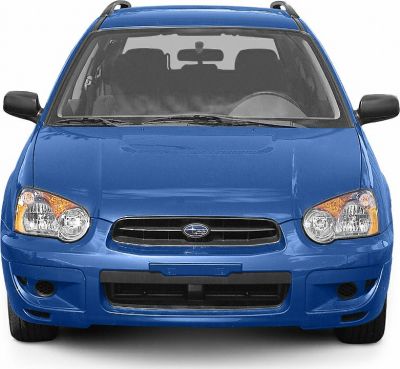 Front view of blue station wagon with distinctive headlights and grille.