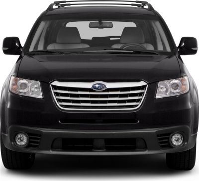 SUV front view with distinctive grille, headlights, roof rails, and fog lights