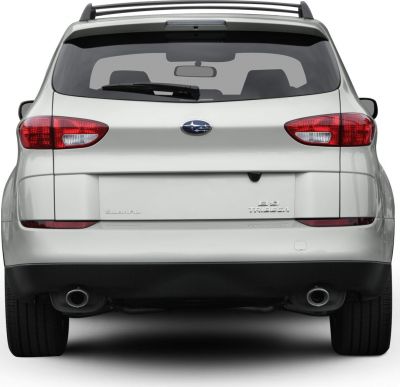 Rear view of SUV with dual exhausts, roof rack, and distinct tail lights