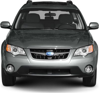 Front view with grille, headlights, and fog lamps.