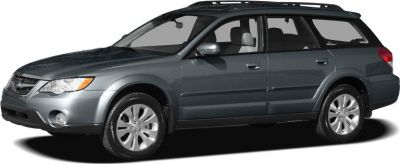 Side profile of a station wagon with roof rails and alloy wheels.