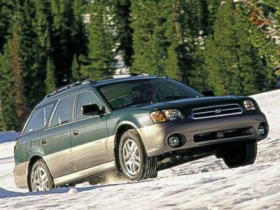 All-wheel drive wagon driving on snowy terrain
