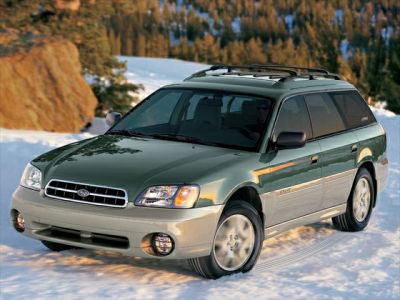 Station wagon in winter landscape with roof racks and rugged design