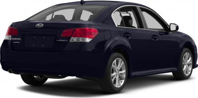 Rear view of sedan with AWD badge and alloy wheels