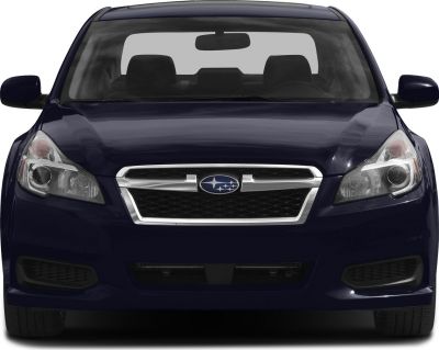 Front view showing grille and headlights