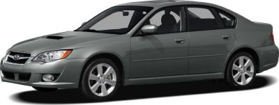 Side view of a sedan with hood scoop and alloy wheels.