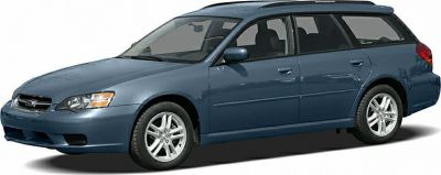 Side view of a 2006 station wagon with roof rails and alloy wheels