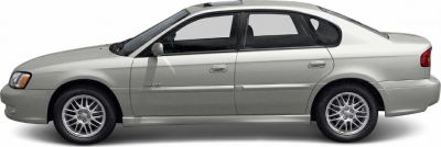 Side profile of a four-door sedan with alloy wheels in silver color.
