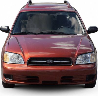 Front view showing headlights and grille of a station wagon.