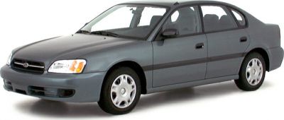 Front side view of a mid-size sedan with classic 1990s design.