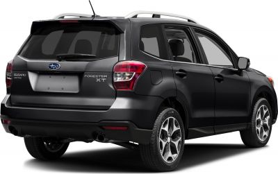 Rear view of Subaru SUV with taillights, roof rails, alloy wheels, and rear spoiler