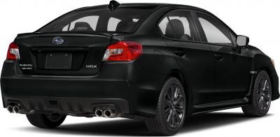 Rear view of a sporty sedan with quad exhaust tips and modern taillights