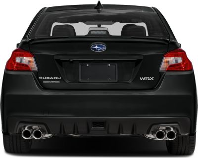 Rear view with quad exhaust tips and distinct tail lights